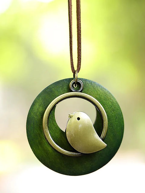 Schattige metalen vogelvormige ronde houten hanger ketting